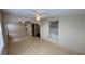 Well-lit sunroom boasts tile flooring, neutral paint, and sliders to the interior of the home at 458 Lancers Dr, Winter Springs, FL 32708