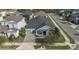 Aerial view of a well-maintained home in a peaceful neighborhood with lush landscaping and a private driveway at 4789 Terrace Bluff St, Winter Garden, FL 34787