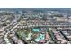 Aerial view of the community highlighting the resort-style amenities including pool, splash park, tennis and clubhouse at 5234 Wildwood Way, Davenport, FL 33837