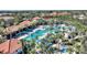 Resort-style community pool area with slides, cabanas, and ample seating for residents to relax and enjoy at 5234 Wildwood Way, Davenport, FL 33837