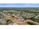 Aerial view of the neighborhood showcasing the community's layout and surrounding greenery at 5415 Fairwood Way # 303, Orlando, FL 32808
