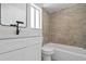 Modern bathroom with neutral tiling, and shower at 5415 Fairwood Way # 303, Orlando, FL 32808