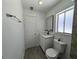 Bathroom featuring modern vanity, sleek black fixtures, neutral paint, and tiled floors at 5415 Fairwood Way # 303, Orlando, FL 32808