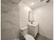 Bathroom featuring modern vanity, square mirror and new fixtures, and tiled shower at 5415 Fairwood Way # 303, Orlando, FL 32808