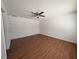 Bedroom with hardwood flooring and a ceiling fan at 5415 Fairwood Way # 303, Orlando, FL 32808