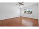 Bright bedroom with laminate floors and natural light at 5415 Fairwood Way # 303, Orlando, FL 32808