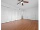 Bedroom features ample closet space and laminate floors at 5415 Fairwood Way # 303, Orlando, FL 32808
