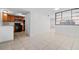 Kitchen area featuring wood cabinets, black appliances and tile floors at 5415 Fairwood Way # 303, Orlando, FL 32808