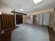 Patio with new paint, storage space, and sliding glass doors, perfect for indoor/outdoor living at 5415 Fairwood Way # 303, Orlando, FL 32808