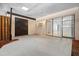 Open patio area featuring sliding glass doors and a storage closet at 5415 Fairwood Way # 303, Orlando, FL 32808