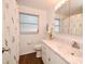 Bathroom featuring floral shower curtain and modern sink at 623 Camellia Ct, Sanford, FL 32773