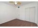 Bedroom featuring neutral walls, brown carpet, ceiling fan, and closet at 623 Camellia Ct, Sanford, FL 32773