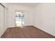 Bedroom with closet and sliding glass door with view of the pool at 623 Camellia Ct, Sanford, FL 32773