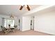 Bright dining room with a view of the yard and a dining table set for gathering at 623 Camellia Ct, Sanford, FL 32773