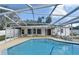 Enjoy this screened pool and patio area perfect for relaxing or entertaining outdoors at 623 Camellia Ct, Sanford, FL 32773