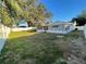 The backyard showcases ample space with a partial view of the screened patio at 7331 Blue Jacket W Pl, Winter Park, FL 32792