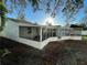 Enclosed patio on an exterior elevation of a home at 7331 Blue Jacket W Pl, Winter Park, FL 32792