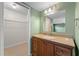 Bathroom featuring a granite countertop vanity and closet at 851 Benchwood Dr, Winter Springs, FL 32708