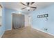 Bedroom with a ceiling fan, window and closet at 851 Benchwood Dr, Winter Springs, FL 32708