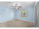 Bedroom with ceiling fan and a window at 851 Benchwood Dr, Winter Springs, FL 32708