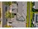 Aerial view of townhome rooftops and manicured lawns showing the layout of the neighborhood at 864 Stonechase Ln, Lake Mary, FL 32746