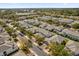 An aerial view of the property, with well-maintained landscaping, and tree lined streets at 864 Stonechase Ln, Lake Mary, FL 32746