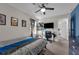 Bedroom with a sports theme, ceiling fan, and carpet flooring at 8995 Croquet Ct, Champions Gate, FL 33896