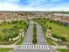 A gated community entrance, complete with manicured landscaping and decorative signage at 8995 Croquet Ct, Champions Gate, FL 33896