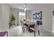 Dining area featuring modern decor, contemporary lighting, and stylish accents at 8995 Croquet Ct, Champions Gate, FL 33896