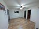 This bedroom features a sliding glass door and a ceiling fan at 9436 Montello Dr, Orlando, FL 32817