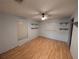 Empty bedroom features wood floors, a ceiling fan, and shelving at 9436 Montello Dr, Orlando, FL 32817