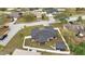 Aerial view shows a well-maintained property with a new roof and fenced yard at 112 Lake Butler Ave, Haines City, FL 33844
