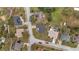 Neighborhood aerial view showcases well-maintained homes, streets, and mature trees at 112 Lake Butler Ave, Haines City, FL 33844