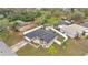 An aerial view shows a well-maintained property with a new roof and fenced yard at 112 Lake Butler Ave, Haines City, FL 33844