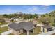 Aerial view of a single-story home with a new roof and fenced yard at 112 Lake Butler Ave, Haines City, FL 33844