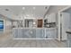 Open kitchen featuring bar area and stainless appliances at 112 Lake Butler Ave, Haines City, FL 33844