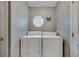 Well-lit laundry room with modern washer and dryer at 112 Lake Butler Ave, Haines City, FL 33844