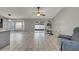 Open living area with sliding glass doors leading to the backyard at 112 Lake Butler Ave, Haines City, FL 33844