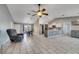 Open-concept living space with dining area and modern-styled kitchen at 112 Lake Butler Ave, Haines City, FL 33844