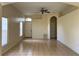 Inviting living room featuring tile flooring, ample natural light, and neutral tones at 13900 Corrine Key Pl, Orlando, FL 32824