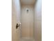 Shower with tiled walls and a shower head at 13900 Corrine Key Pl, Orlando, FL 32824