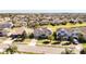 A lovely residential street shows a great view of the neighborhood, with similar two-story homes and well-kept lawns at 15165 Heron Hideaway Cir, Winter Garden, FL 34787