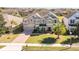 Beautiful two-story home with manicured lawn, brick driveway, and mature landscaping in a desirable neighborhood at 15165 Heron Hideaway Cir, Winter Garden, FL 34787