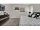 Bedroom with carpet, a queen bed, dark furniture, and decor above the bed at 15914 Moonlight Bay St, Winter Garden, FL 34787