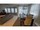 Open dining area with table and chairs, chandelier, and lots of natural light at 1731 Caribbean View Ter, Kissimmee, FL 34747