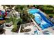Aerial view of a FlowRider attraction, featuring a continuous wave machine, and a splash pad area at 1731 Caribbean View Ter, Kissimmee, FL 34747