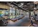 Spacious gym with modern exercise equipment, treadmills, weights, and mirrors for a complete fitness experience at 1731 Caribbean View Ter, Kissimmee, FL 34747