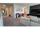 A second floor hallway with a view into the adjacent upstairs living room at 1731 Caribbean View Ter, Kissimmee, FL 34747