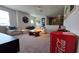 Inviting living area boasts a comfortable sofa, a decorative wood table, and a large screen television at 1731 Caribbean View Ter, Kissimmee, FL 34747