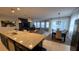 A gourmet kitchen with a center island overlooks the living and dining areas at 1731 Caribbean View Ter, Kissimmee, FL 34747